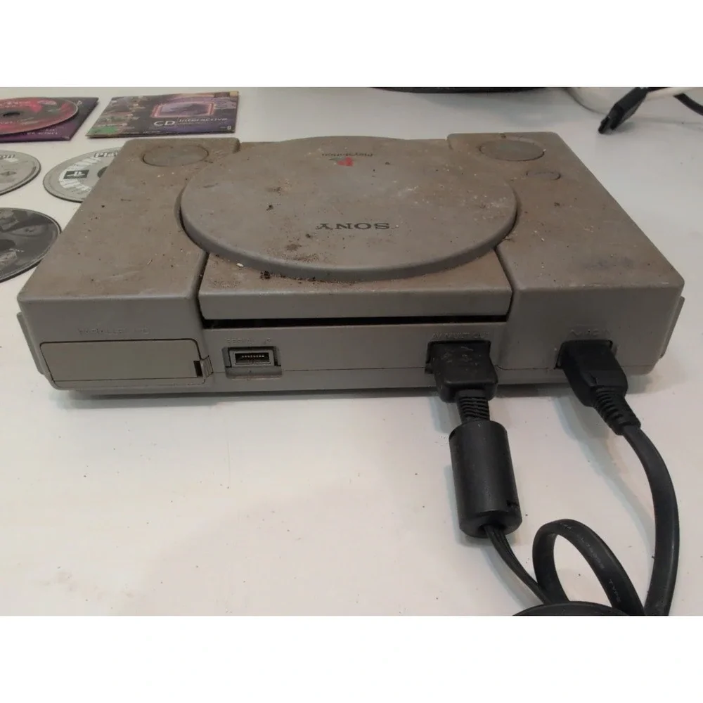 Sony PlayStation 1 Gray  System Tested Working Plus 2 Controllers 8 Games Cords